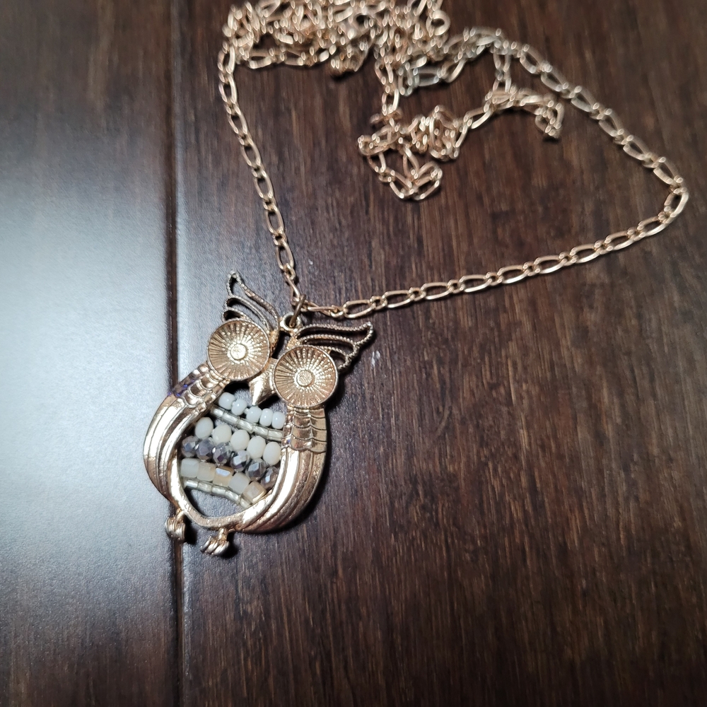 Gold and White Owl Pendant Necklace with Intricate Design